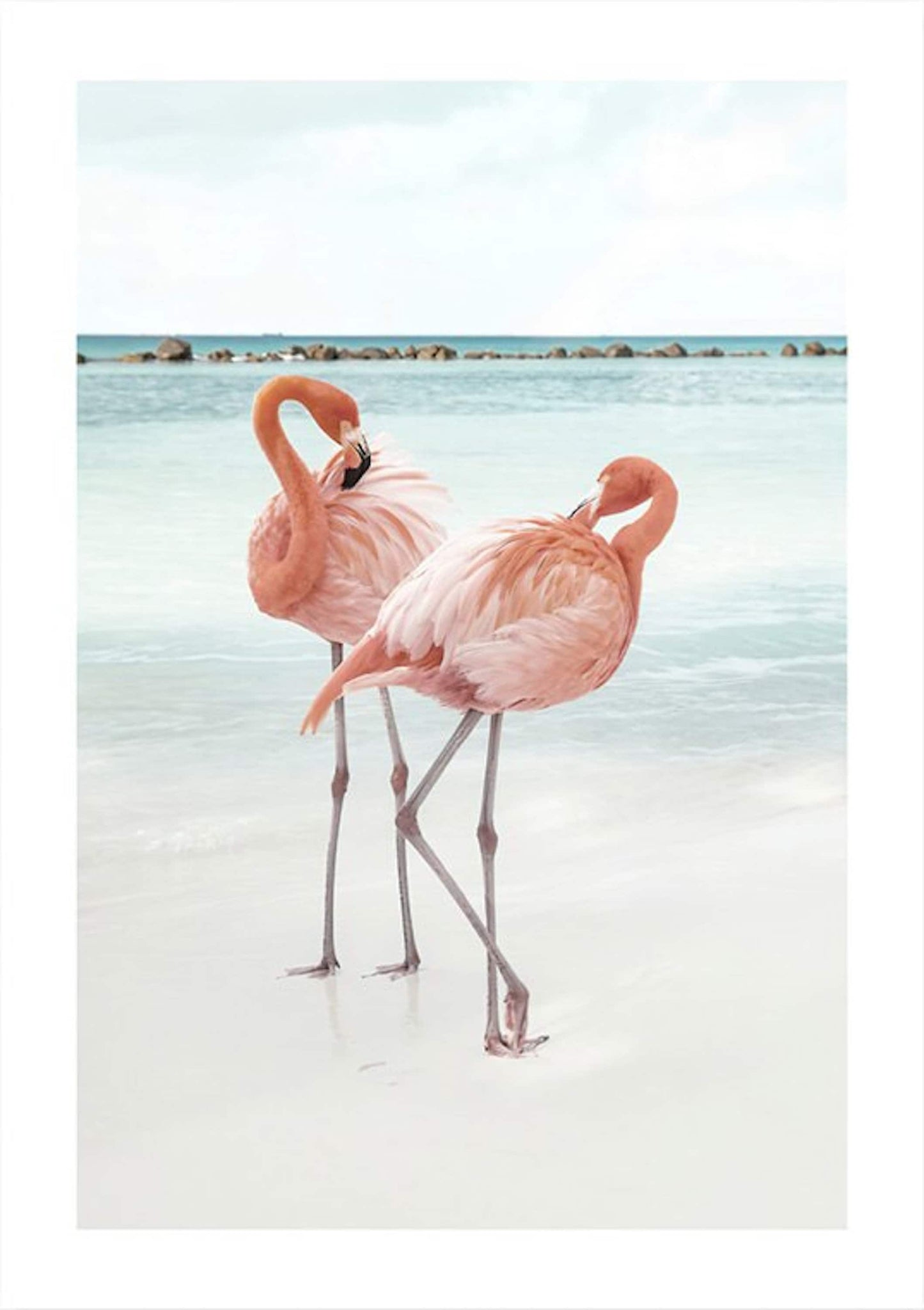 Zwei elegante Flamingos am Strand, als fröhliches Poster von JustGoodMood, passend für eine tropische Raumgestaltung.