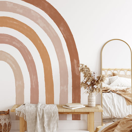 Stylischer Boho Stil Regenbogen Wandaufkleber von justgoodmood, dekoriert ein Kinderzimmer mit warmen Farbtönen.