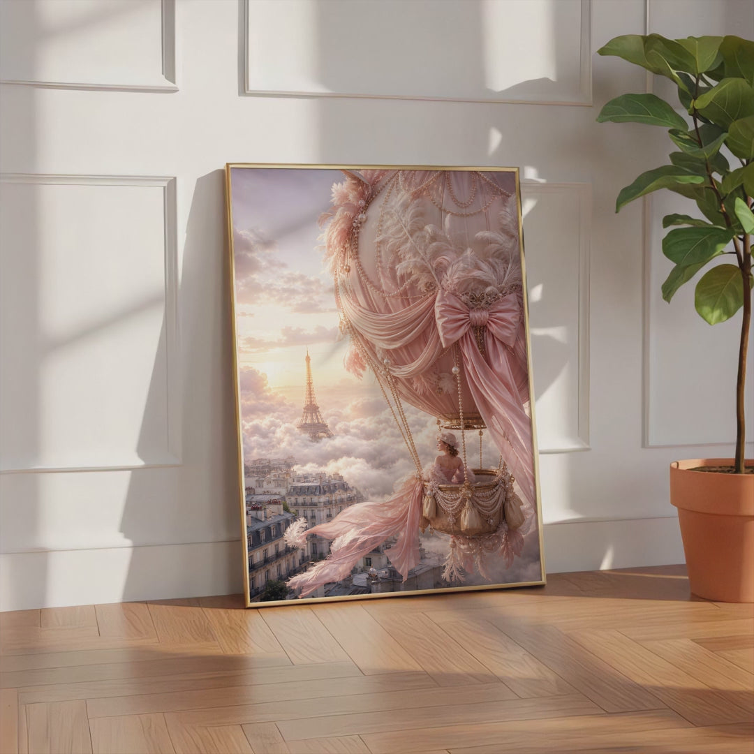Videoansicht des gerahmten Posters mit rosafarbenem Heißluftballon mit Perlen und Schleifen über Paris bei Sonnenuntergang.